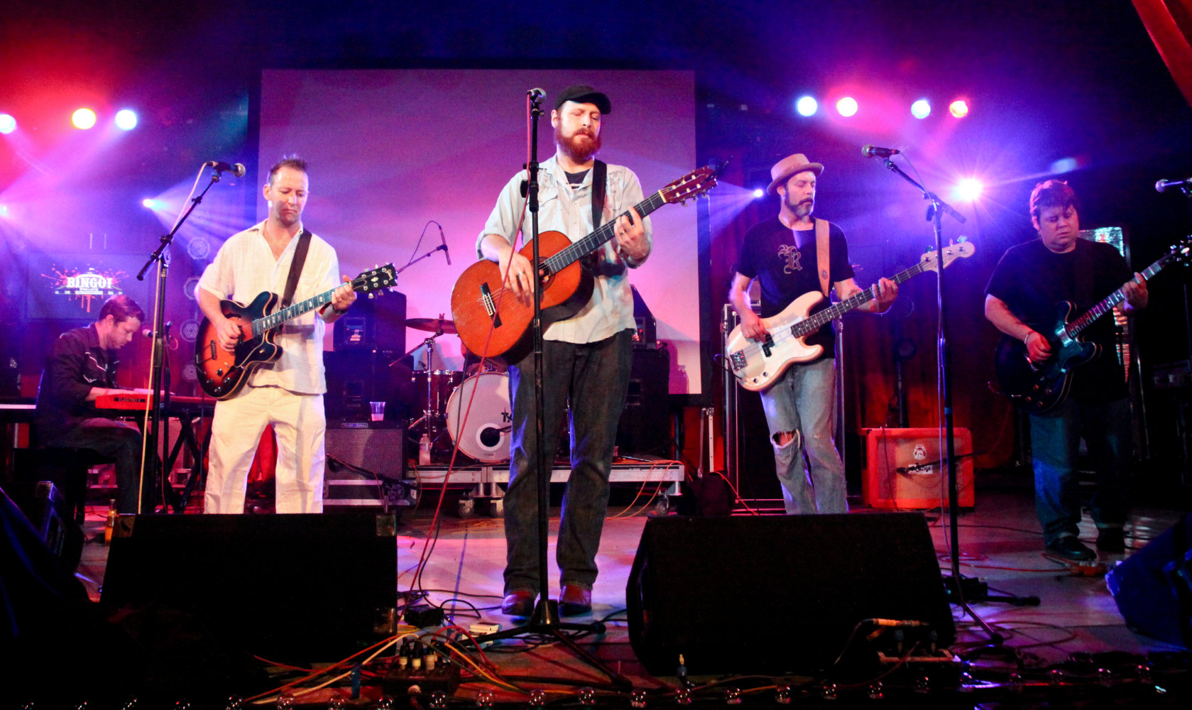 Luke Allen and Happy Talk Band on stage.
